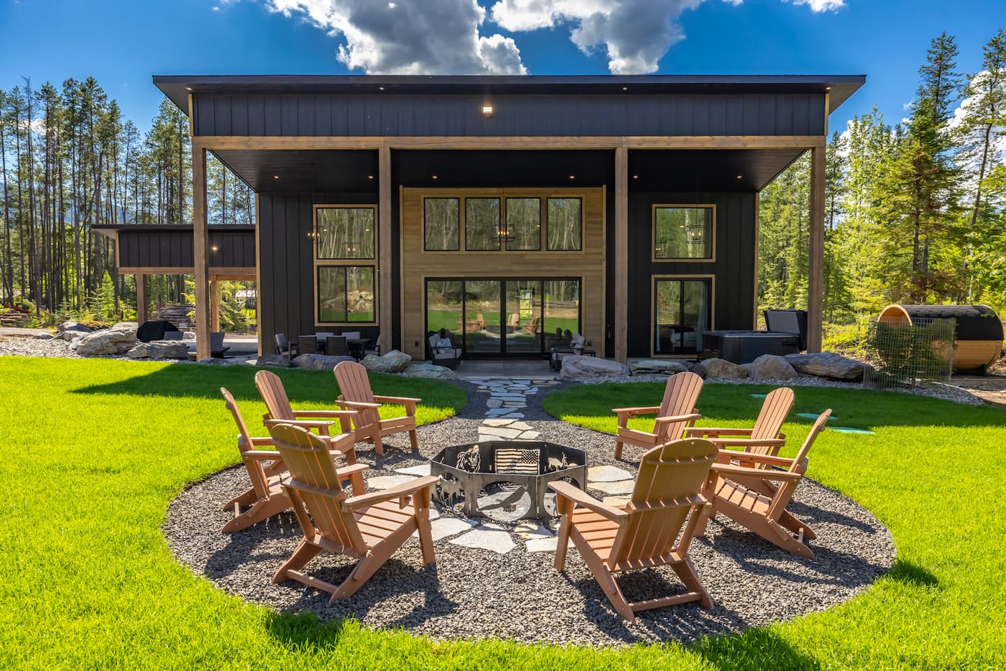Glacier Getaway 2 contemporary exterior and fire pit